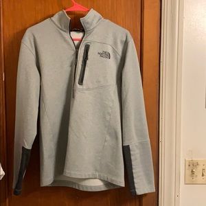 A gray 1/2 zip fleece